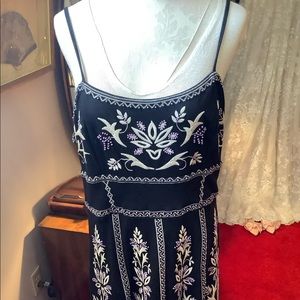 Adorable dress - sad to let go; just couldn’t lose the weight.